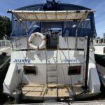 Motoryacht Van Vliet Atico 38 Joanne (1994) – Heckansicht mit Badeleiter