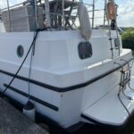 Niederländische Motoryacht Vetus 1200 Damier (1992) – Heck mit Badeplattform und Badeleiter