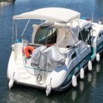 Flusskreuzer Nicols 1100 Lodève (1998) – Luftaufnahme achtern steuerbord auf dem Wasser